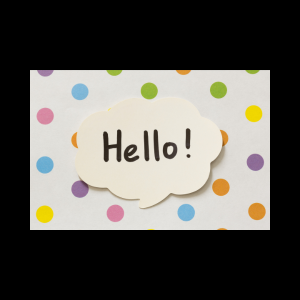 Hello written on a speech bubble with a polka dot background